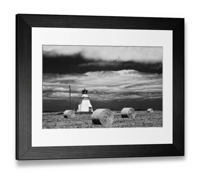 Framed Print : Canada, Prince Edward Island, Darnley. Lighthouse and hay bales Framed Print : Canada, Prince Edward Island, Darnley. Lighthouse and hay bales