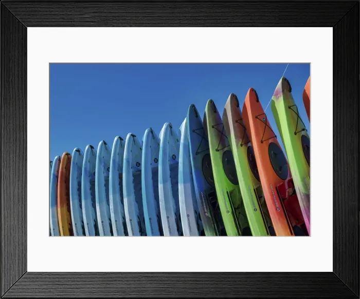 Framed Print : Stacked kayaks on a beach, Florida, USA