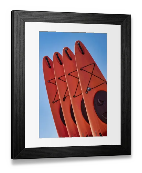 Framed Print : Stacked red kayaks on a beach, Florida, USA Framed Print : Stacked red kayaks on a beach, Florida, USA