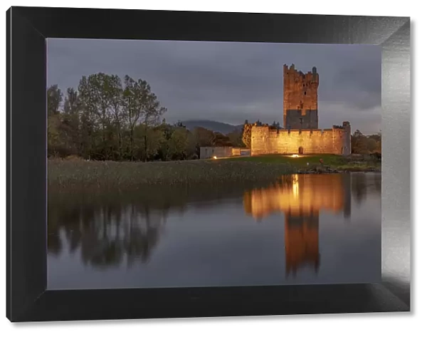 Historic Ross Castle at dusk in Killarney National Park, Ireland
