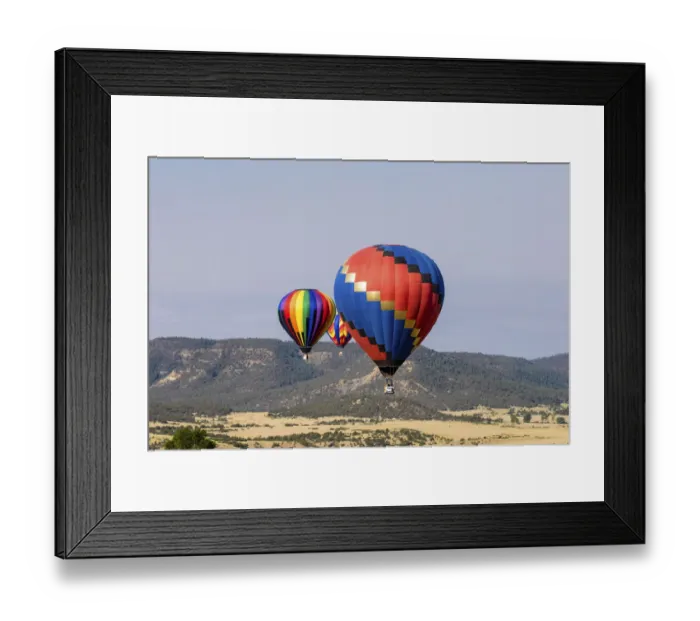 Framed Print : Hot air balloon bringing color to the sky. (Editorial Use Only) Framed Print : Hot air balloon bringing color to the sky. (Editorial Use Only)
