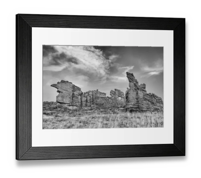 Framed Print : Africa, Madagascar, Isalo National Park. The clouds set off the sandstone formation in this black