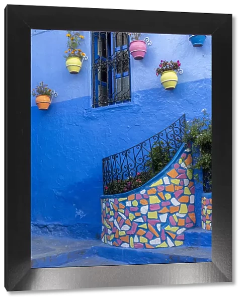 Africa, Morocco, Chefchaouen. Colorful house exterior