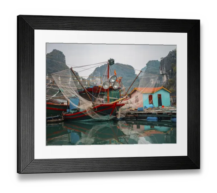 Framed Print : Asia, Vietnam, Quang Ninh, Ha Long Bay. Colorful fishing boat at its dock is reflected Framed Print : Asia, Vietnam, Quang Ninh, Ha Long Bay. Colorful fishing boat at its dock is reflected