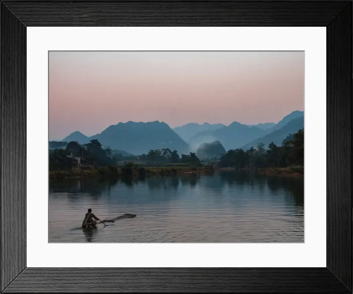 Framed Print : Asia, Vietnam, Pu Luong Nature Reserve. Lone man takes simple raft out onto river Framed Print : Asia, Vietnam, Pu Luong Nature Reserve. Lone man takes simple raft out onto river