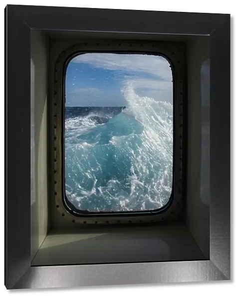 Antarctica, Drake Passage. Window view of waves