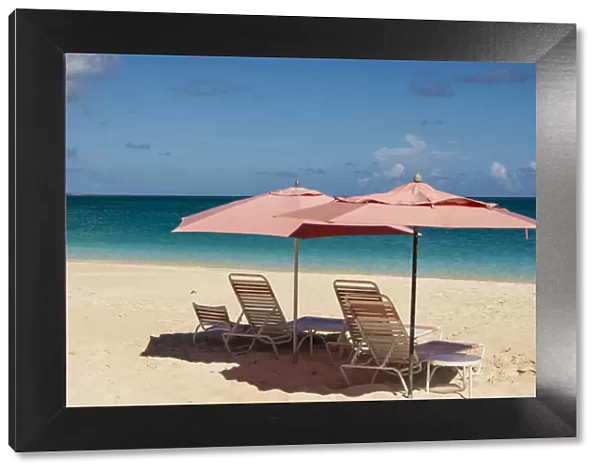 Beach umbrellas on Grace Bay Beach, Providenciales, Turks and Caicos Islands, Caribbean