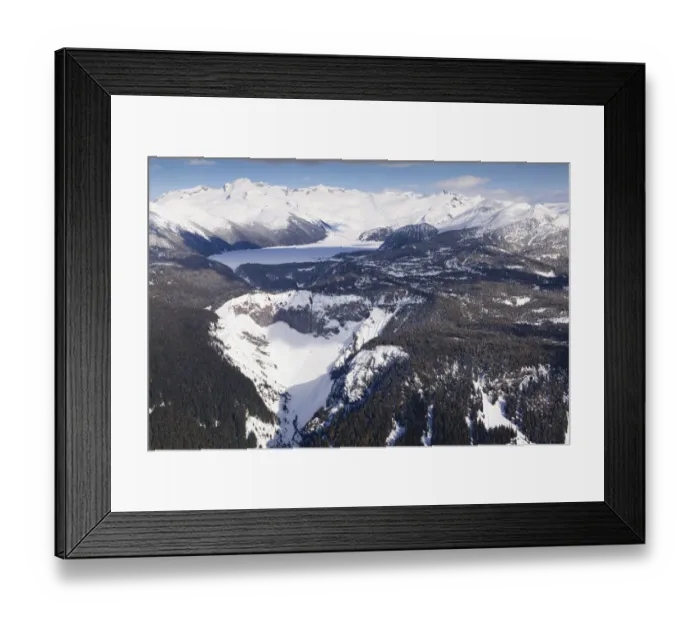 Framed Print : Aerial view of frozen Garibaldi Lake and lava barrier in the foreground