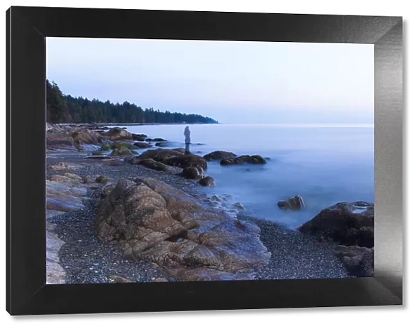 Long exposure of a transparent image of woman on the beach in Sechelt, British Columbia