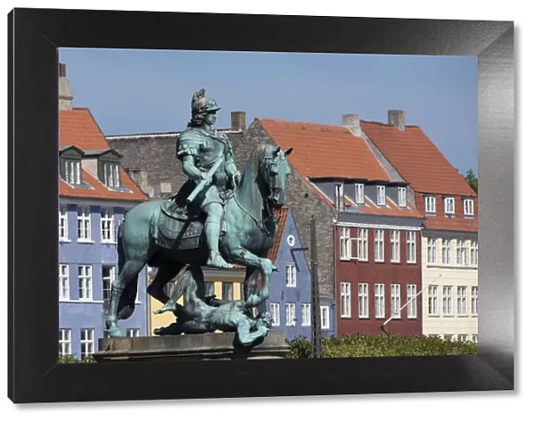 Denmark, Copenhagen, Nyhavn district in city center. Statue of the Bishop of Absalon