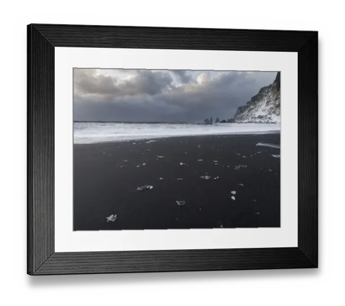 Framed Print : Coast near Vik i Myrdal during winter. Black volcanic beach with the Reynisdrangar sea stacks