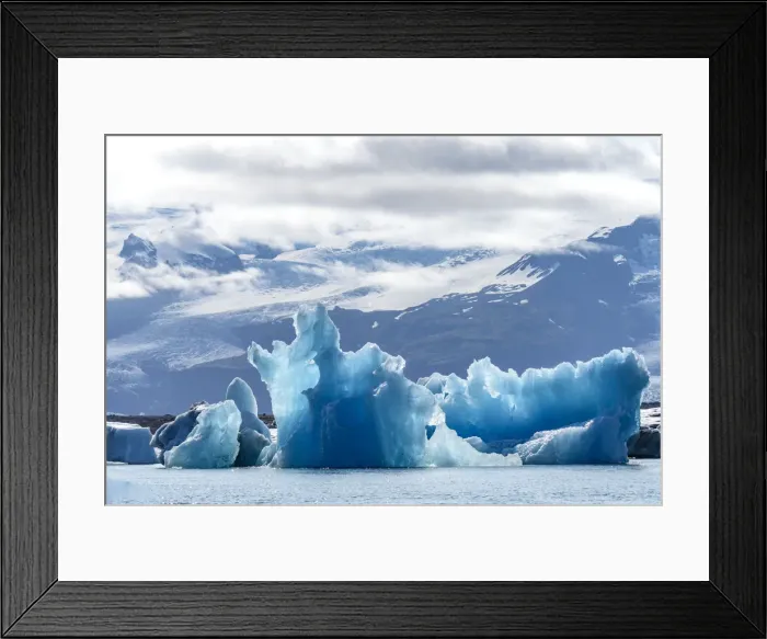 Framed Print : Iceland, floating glaciers form blue ice sculptures in Jokulsarlon, glacier lagoon Framed Print : Iceland, floating glaciers form blue ice sculptures in Jokulsarlon, glacier lagoon