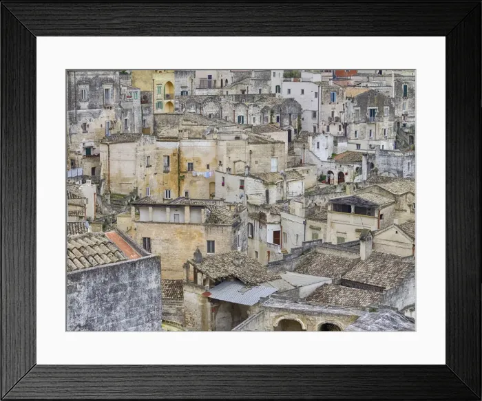 Framed Print : Historic cave dwellings, called Sassi houses, in the village of Matera