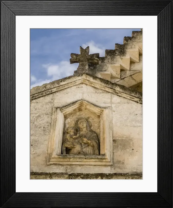 Framed Print : Carving on a small chapel in old town Matera
