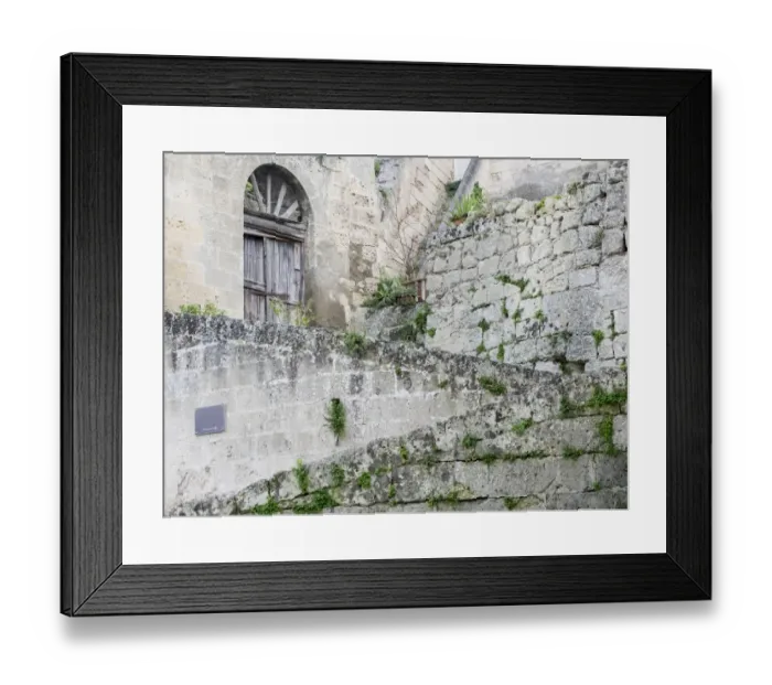 Framed Print : Cobblestone steps leading to the entrance of a Sassi home in the old town of Matera