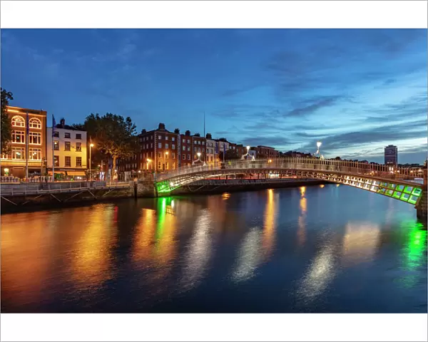 Historic Ha Penny walking bridge over the River Liffey in Dublin, Ireland