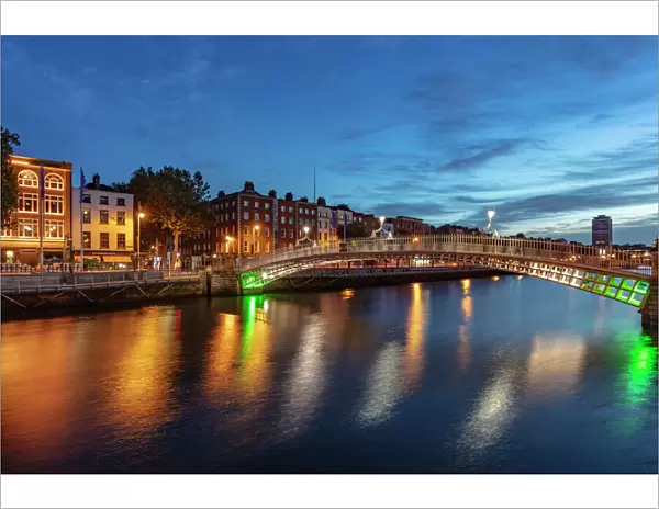 Historic Ha Penny walking bridge over the River Liffey in Dublin, Ireland