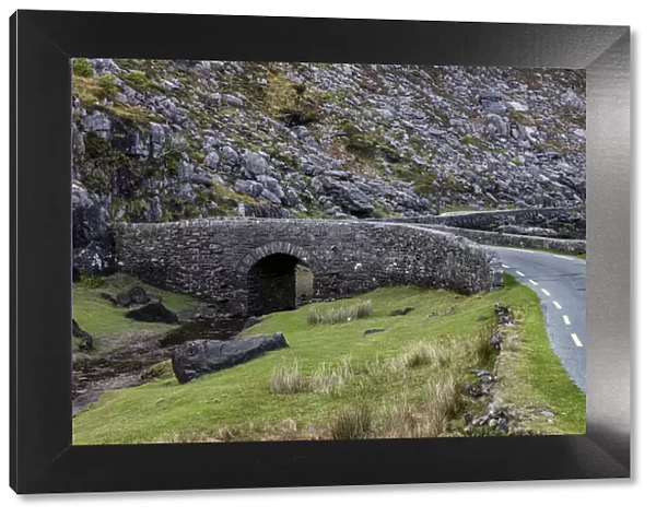 Narrow roadway over stone bridge at the Gap of Dunloe near Killarney, Ireland