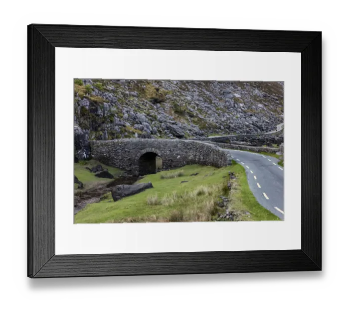 Framed Print : Narrow roadway over stone bridge at the Gap of Dunloe near Killarney, Ireland