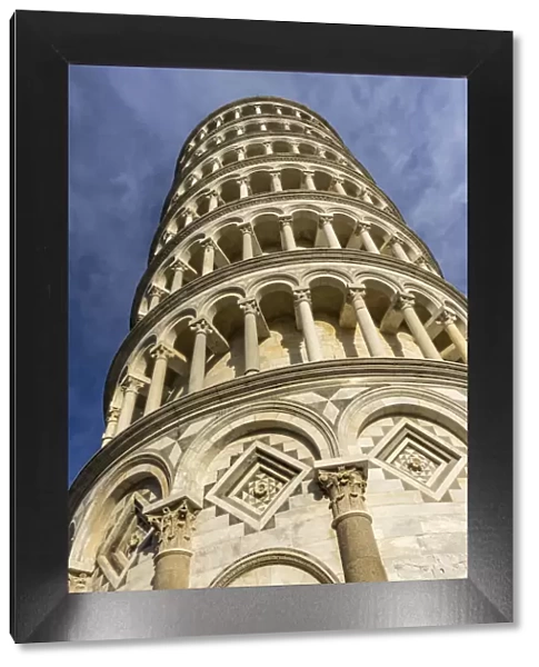 Low-angle view of Leaning Tower of Pisa, Tuscany, Italy. Completed in 1100 s