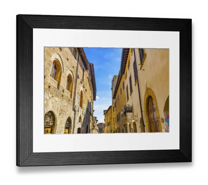 Framed Print : Hotel and bars on Medieval street, San Gimignano, Tuscany, Italy Framed Print : Hotel and bars on Medieval street, San Gimignano, Tuscany, Italy