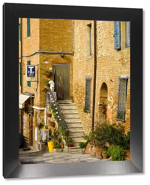 Italy, Tuscany. Brick building doorway
