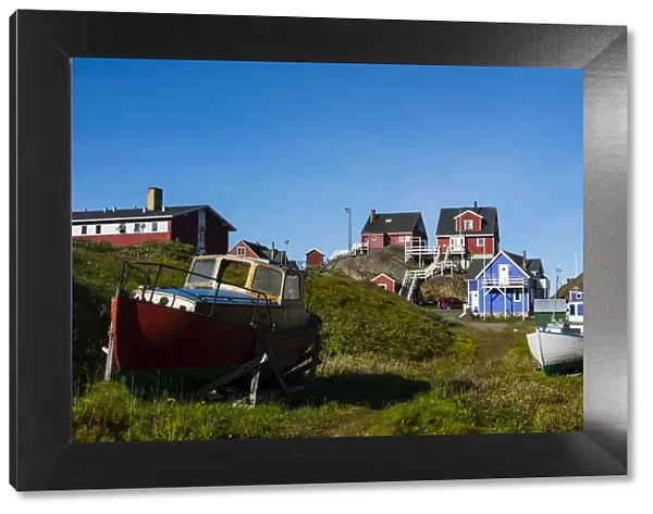 Greenland. Sisimiut. Fishing boats and colorful houses