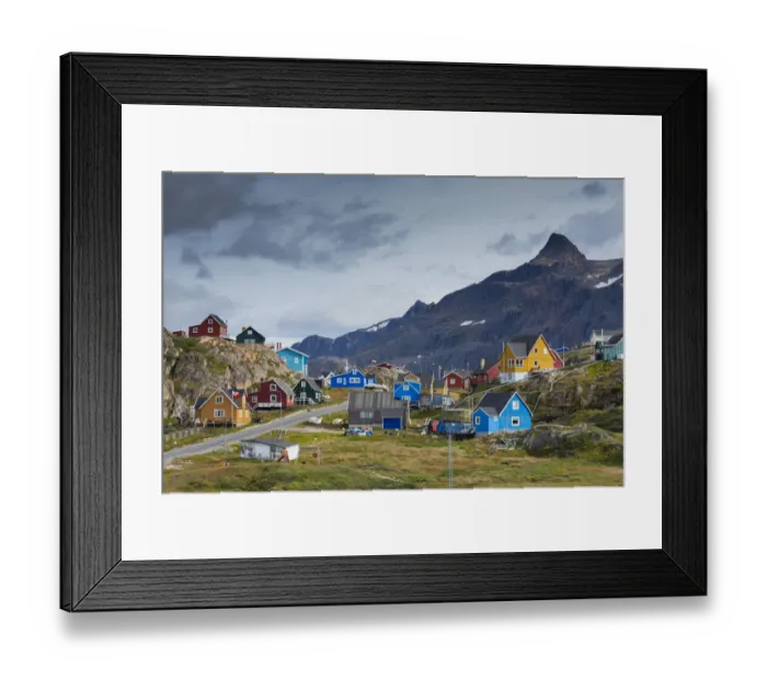 Framed Print : Greenland, Sisimiut. Nassaaq mountain towering above colorful Sisimiut