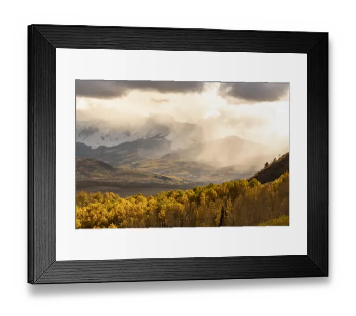 Framed Print : USA, Colorado, San Juan Mountains. Snow flurries over mountain and valley at sunset