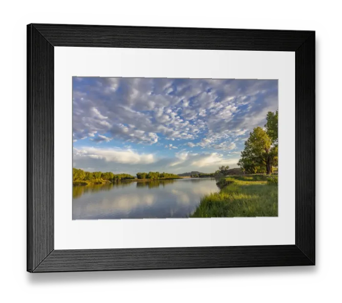 Framed Print : Sunrise and clouds over the Powder River near the confluence with the Yellowstone River near Terry