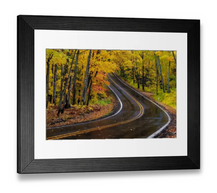 Framed Print : Highway 41 covered roadway in autumn near Copper Harbor in the Upper Peninsula of Michigan