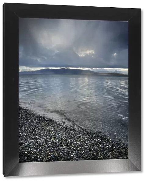 Stormy winter clouds over Bellingham Bay, Washington State. Lummi Island in the distance