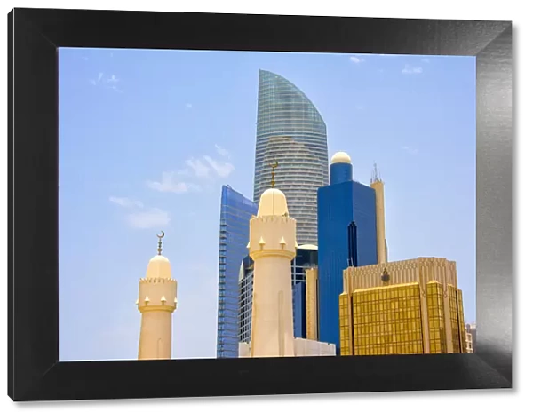 Mosque with modern high-rises in downtown, Abu Dhabi, United Arab Emirates
