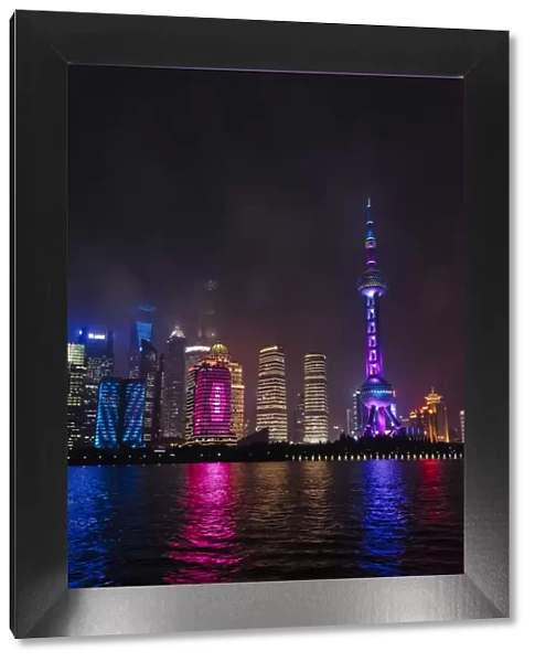 Night view of high-rises by Huangpu River, Pudong, Shanghai, China