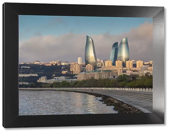Azerbaijan, Baku. City skyline with Baku Television Tower and Flame Towers from Baku Bay