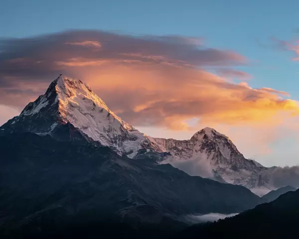 Asia, Nepal. Annapurna South (7, 219 Meter) and clouds at sunrise, viewed from Poon Hill