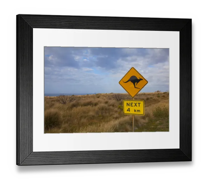 Framed Print : Kangaroo caution road sign along the Great Ocean Road, Australia Framed Print : Kangaroo caution road sign along the Great Ocean Road, Australia