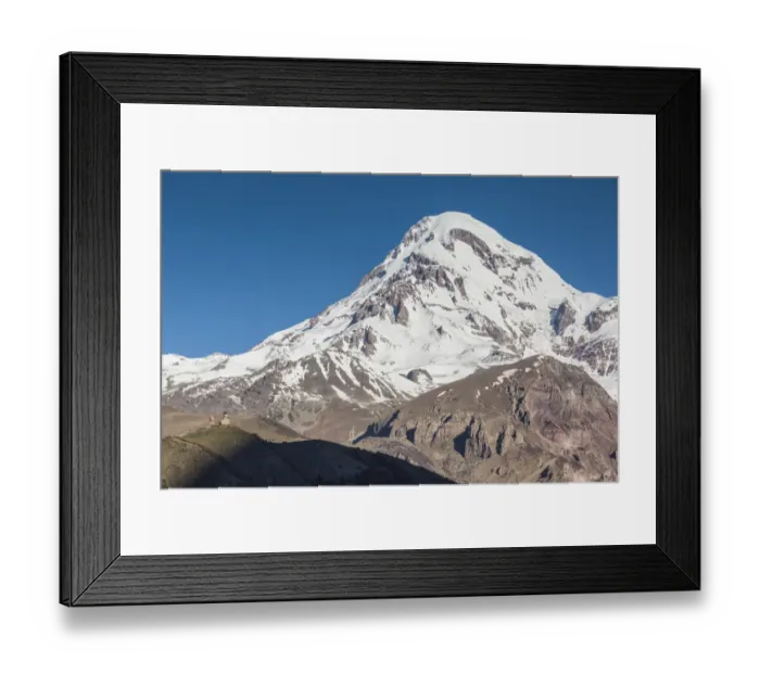 Framed Print : Georgia, Georgian Military Highway, Kazbegi-Stepantsminda. Gergeti Trinity Church and Mt