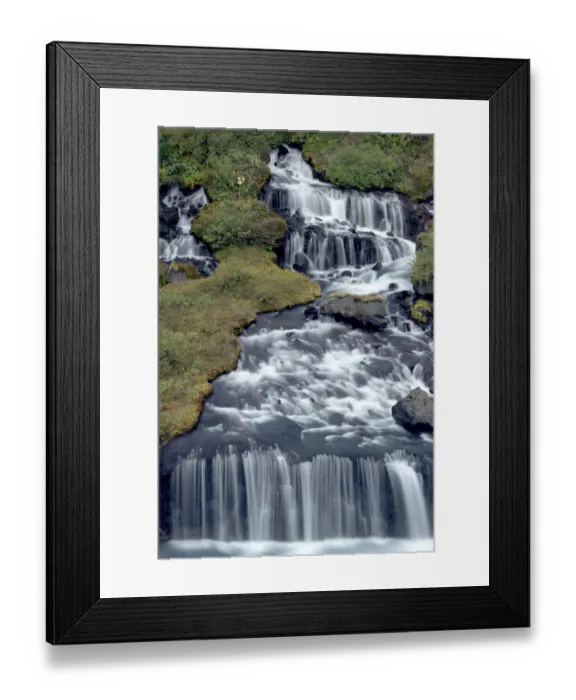 Framed Print : Iceland, Hraunfossar. Tiny cascades emerge from the lava to flow into the Hvita River