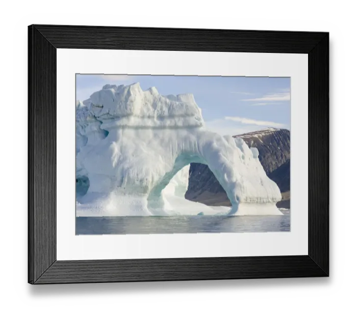 Framed Print : Iceberg in the Uummannaq Fjord System. Glaciated Nuussuaq peninsula in the background Framed Print : Iceberg in the Uummannaq Fjord System. Glaciated Nuussuaq peninsula in the background