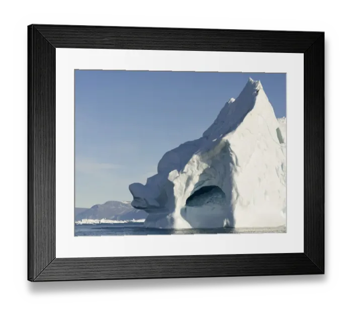 Framed Print : Iceberg in the Uummannaq Fjord System. Glaciated Nuussuaq peninsula in the background