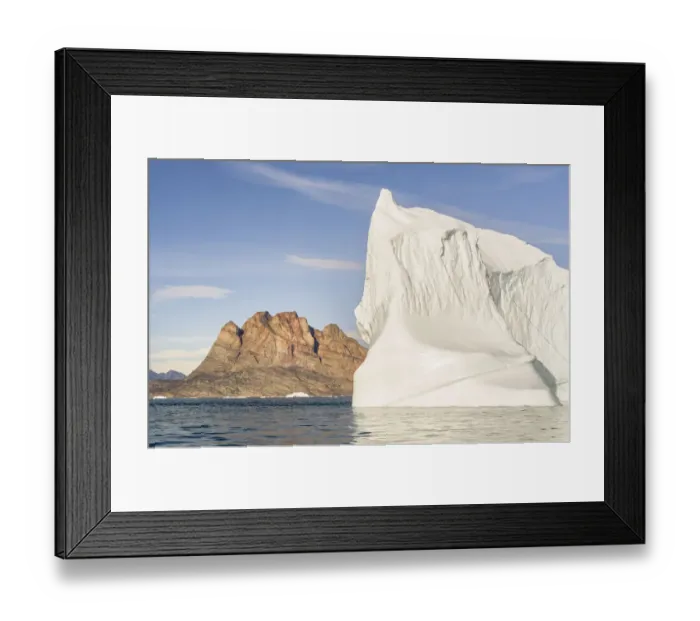 Framed Print : Iceberg in the Uummannaq Fjord System. Uummannaq Island in the background