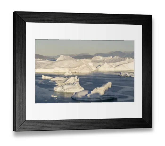 Framed Print : Iceberg in the Uummannaq Fjord System. Glaciated Nuussuaq peninsula in the background Framed Print : Iceberg in the Uummannaq Fjord System. Glaciated Nuussuaq peninsula in the background