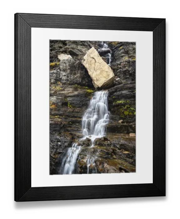 Framed Print : USA, Montana. Boulder and waterfall in Glacier National Park