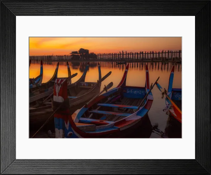 Framed Print : Sunrise over the lake with fishermen on boats fishing in the lake near wooden footbridge Framed Print : Sunrise over the lake with fishermen on boats fishing in the lake near wooden footbridge