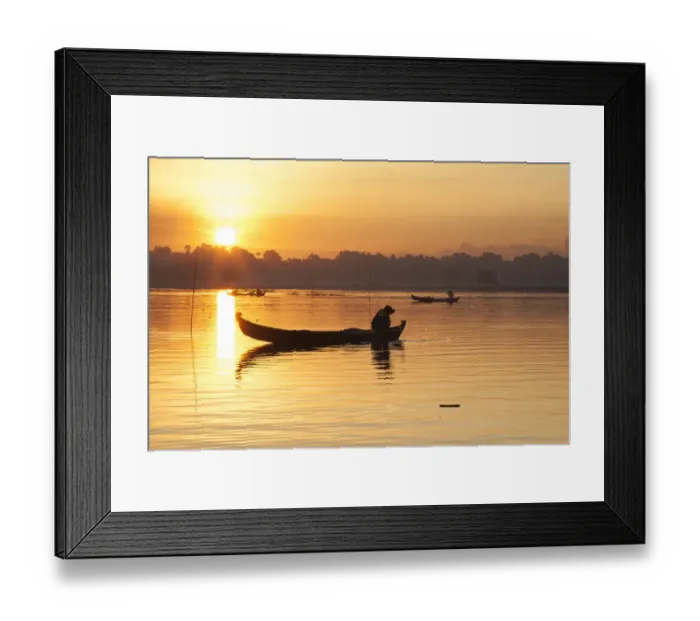 Framed Print : Sunrise over the lake with fishermen on boats fishing in the lake near wooden footbridge Framed Print : Sunrise over the lake with fishermen on boats fishing in the lake near wooden footbridge