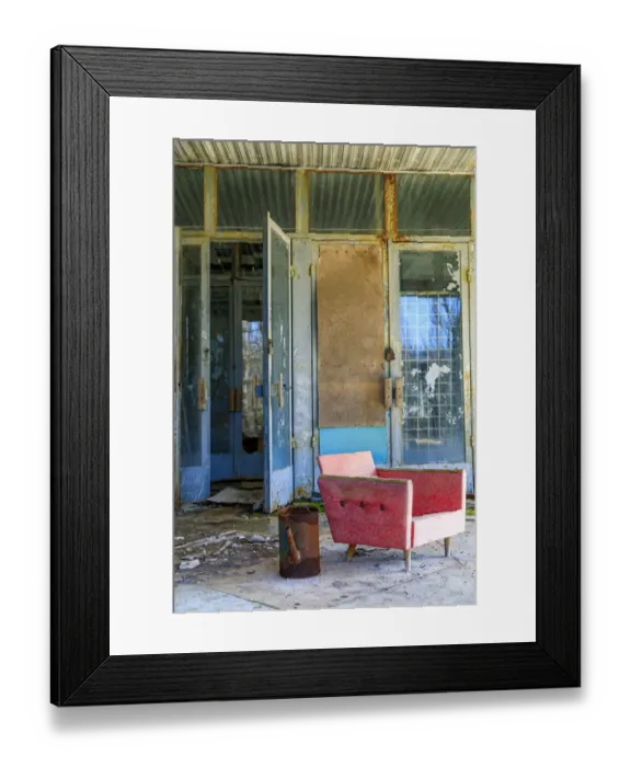 Framed Print : Ukraine, Pripyat, Chernobyl. A coral-colored modernist chair sits outside an abandoned Framed Print : Ukraine, Pripyat, Chernobyl. A coral-colored modernist chair sits outside an abandoned