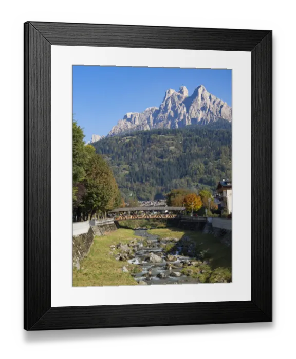Framed Print : River Cismon, in the background Pale di San Martino. Fiera di Primiero in the valley of Framed Print : River Cismon, in the background Pale di San Martino. Fiera di Primiero in the valley of