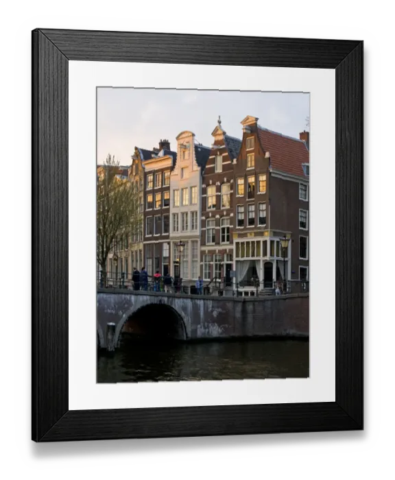 Framed Print : Netherlands, Amsterdam. Traditional houses along the canals and bridge crossing