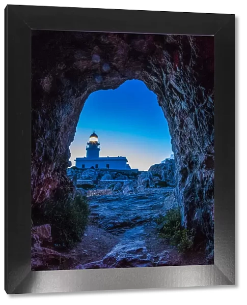 Spain, Menorca. Lighthouse at Cavalleria at sunrise